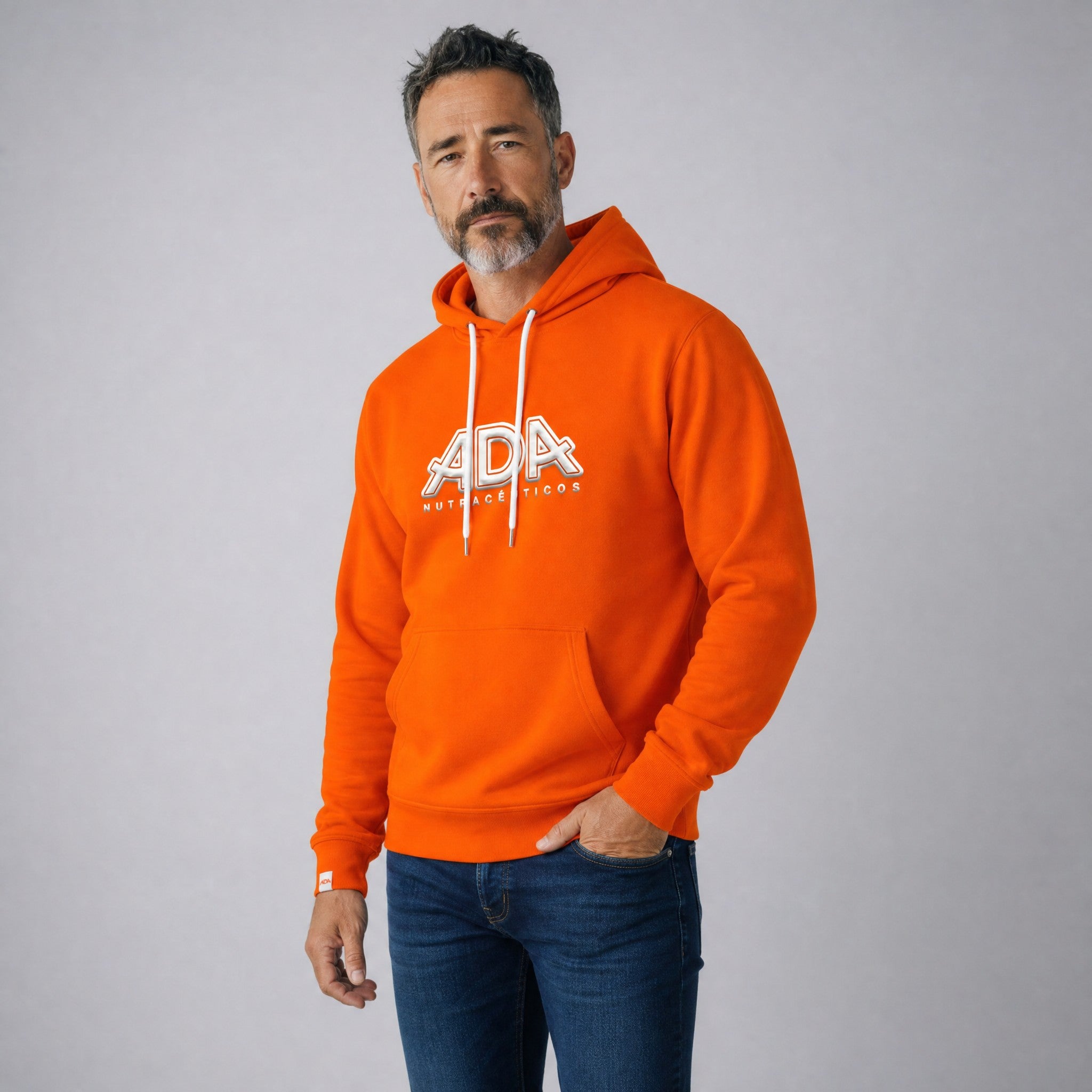 Ada Nutraceuticos orange hooded sweatshirt with white drawstrings and a front pocket. Features a 3D logo on the chest.